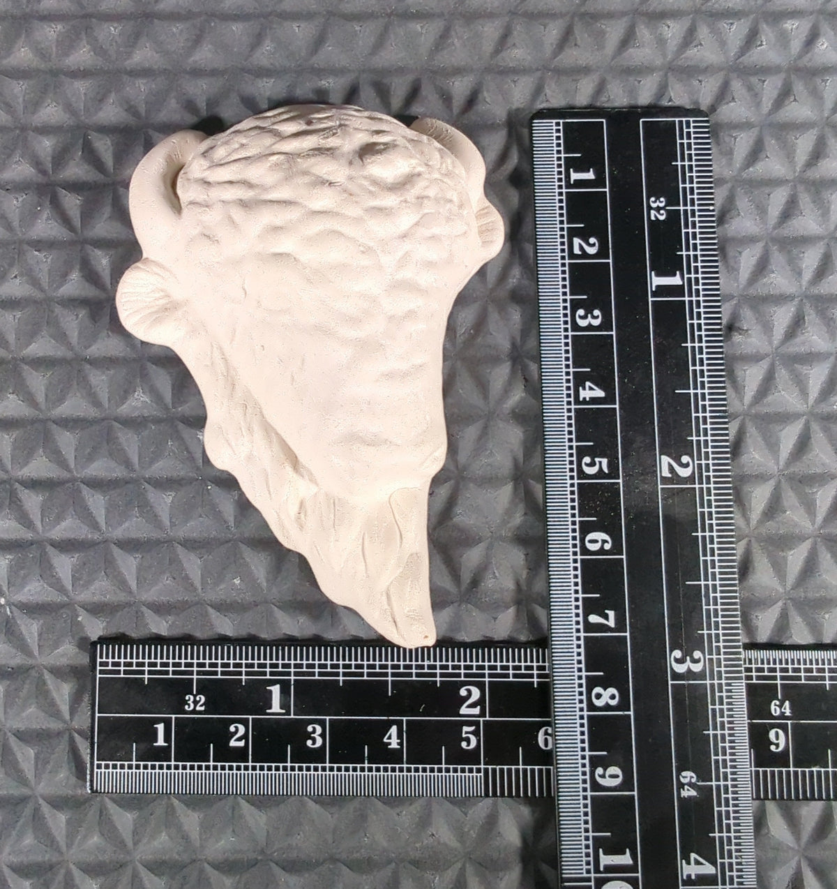 CM1014B - 277 Kimple Animal Heads Cone 6 Bisque