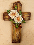 Ceramic mold wooden cross with floral design on a beige wall example.