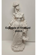 Decorative statue of a woman in an elaborate dress on a white background