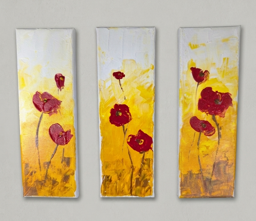 Three vertical wall art panels with red floral designs on a yellow background.