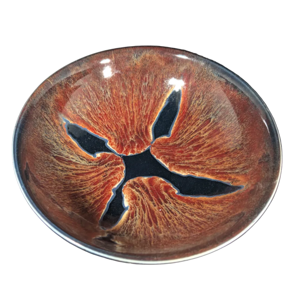 Ceramic bowl with a unique design on a white background