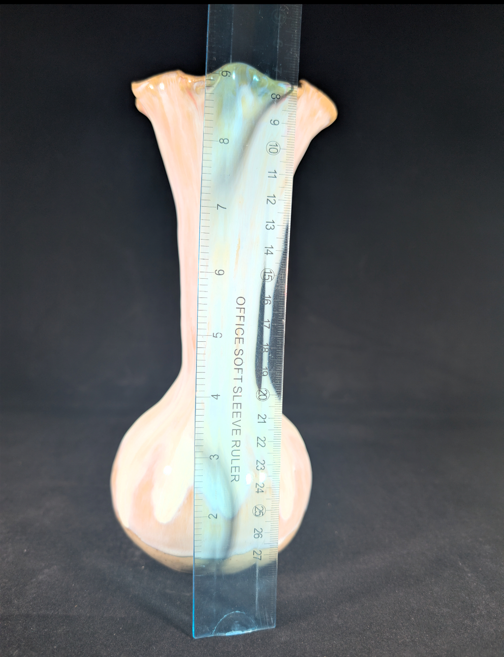 Measurement tool on a shell against a black background
