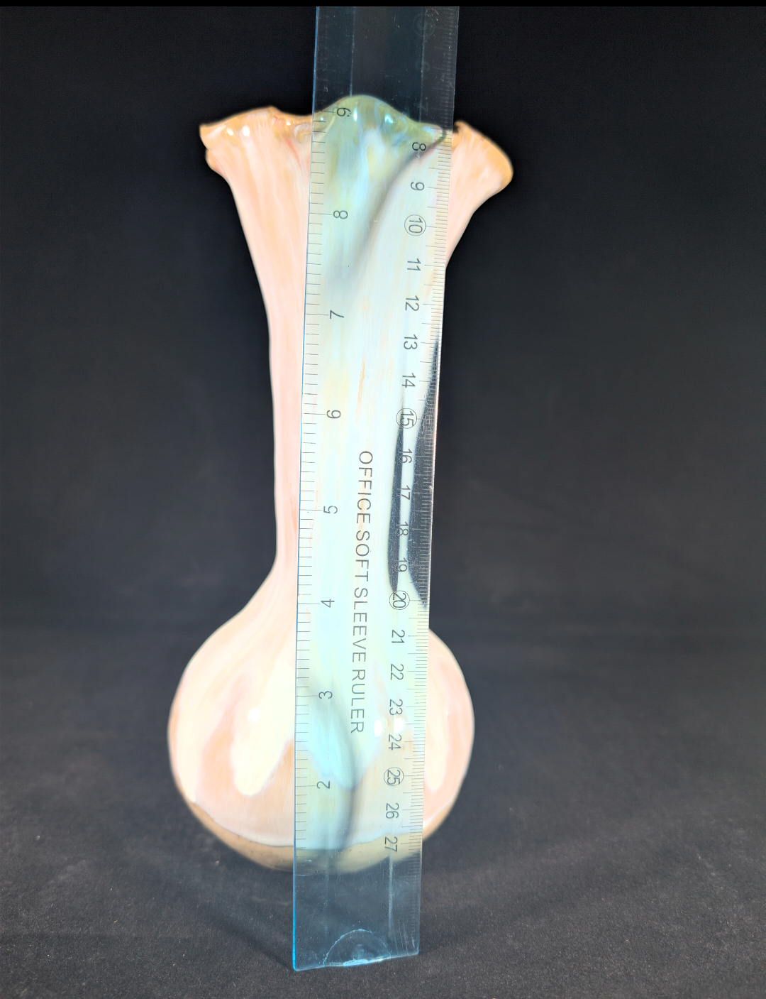 Measurement tool on a shell against a black background