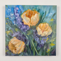 Painting of yellow flowers and purple hyacinths on a white wall