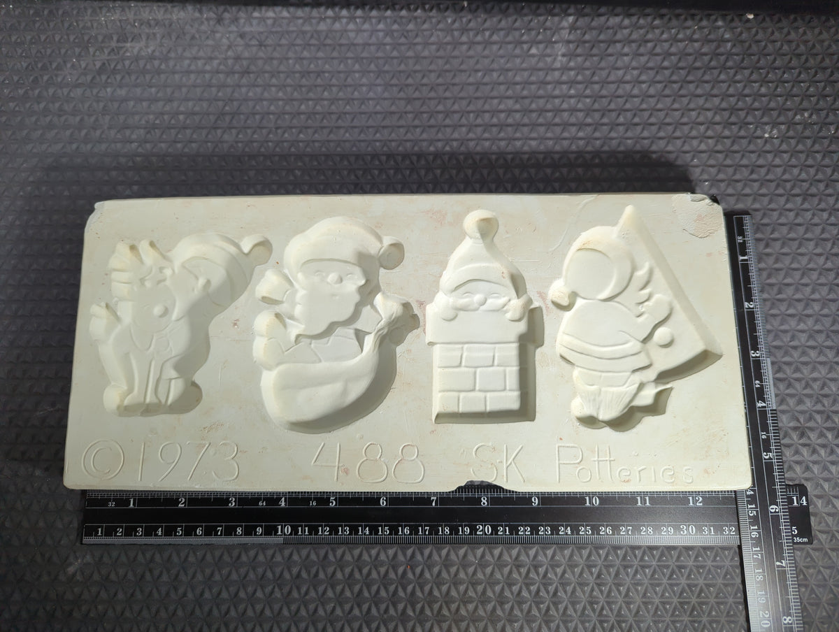CM1320 -  488 SK Potteries Open Pour (4) Santa Ornaments Mold