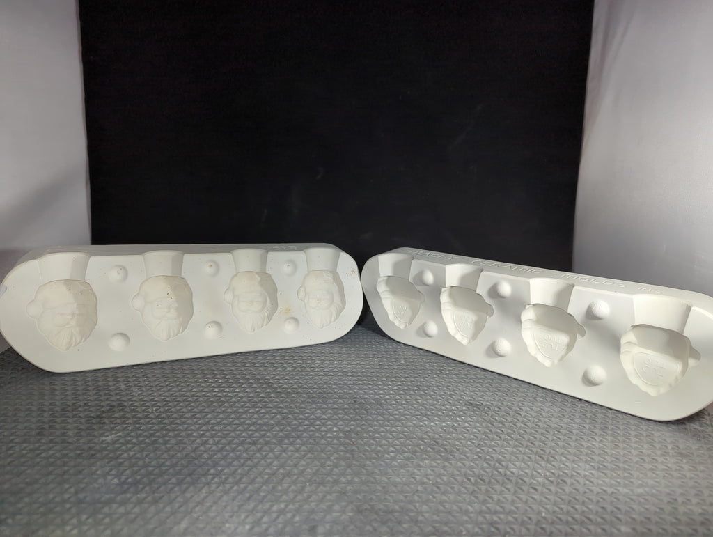 CM1323 -  593 Macky Molds Santa Napkin Holders (4) Mold