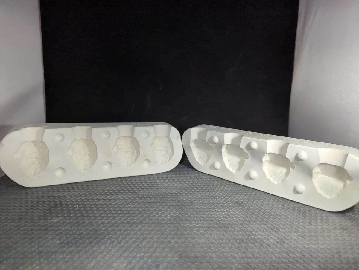 CM1323 -  593 Macky Molds Santa Napkin Holders (4) Mold